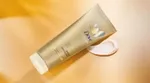 Dove Summer Revived lotion from Dove’s gradual tan range to give skin a summer glow. Product shown with amber background